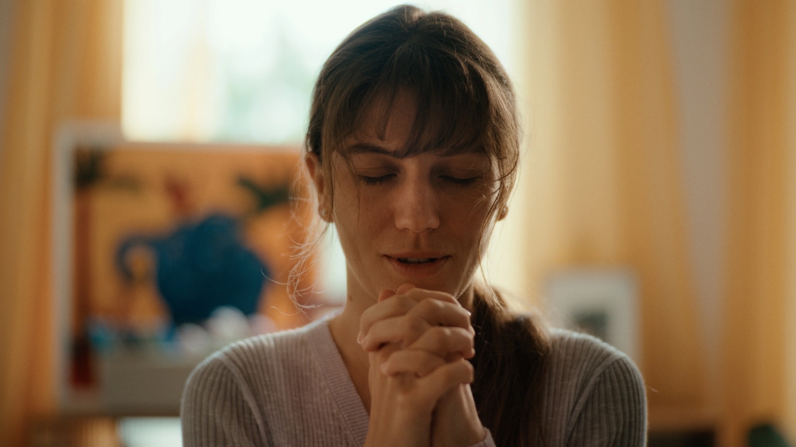 A woman in a quiet moment of reflection
