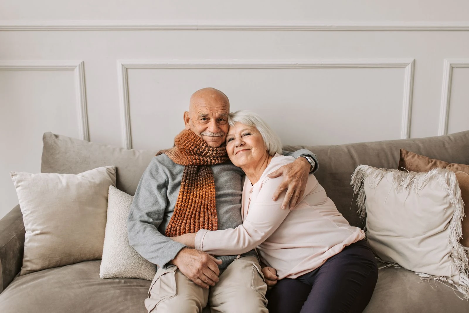 A couple sharing a warm embrace at home